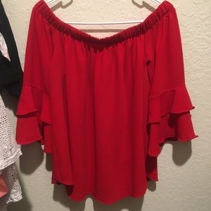 red off the shoulder shirt